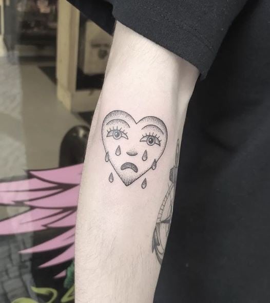 Grey Crying Heart Forearm Tattoo