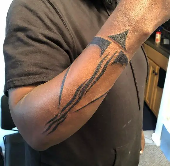 Sagittarius Tribal Forearm Tattoo