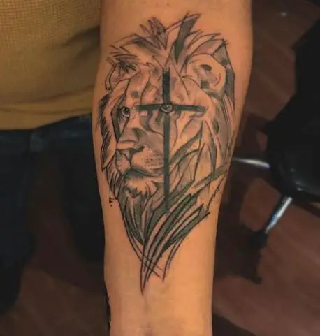Lion and Black Cross Forearm Tattoo