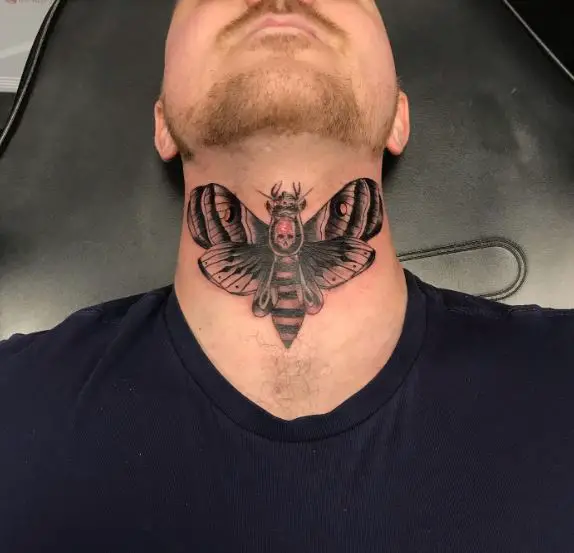 Red Skull on Death Moth Throat Tattoo