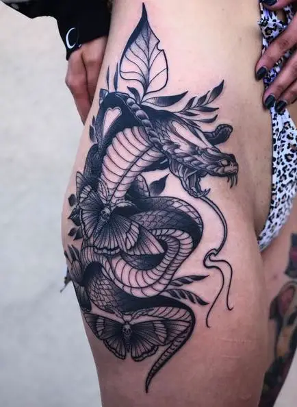 Cobra and Death Moths Hip Tattoo