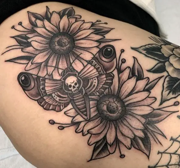 Flowers and Death Moth Hip Tattoo