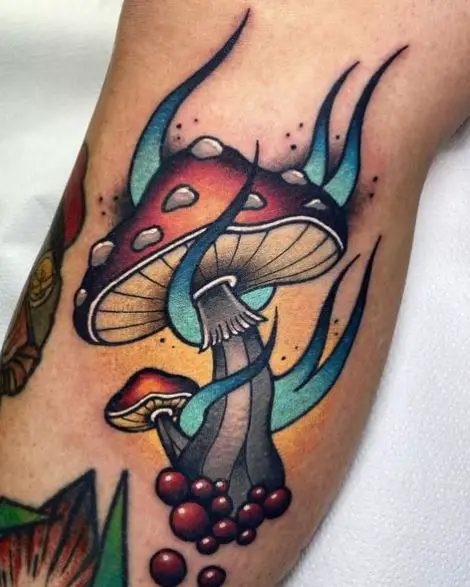 Blue Flames on Mushroom Leg Tattoo