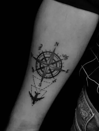 Black Plane and Compass Forearm Tattoo