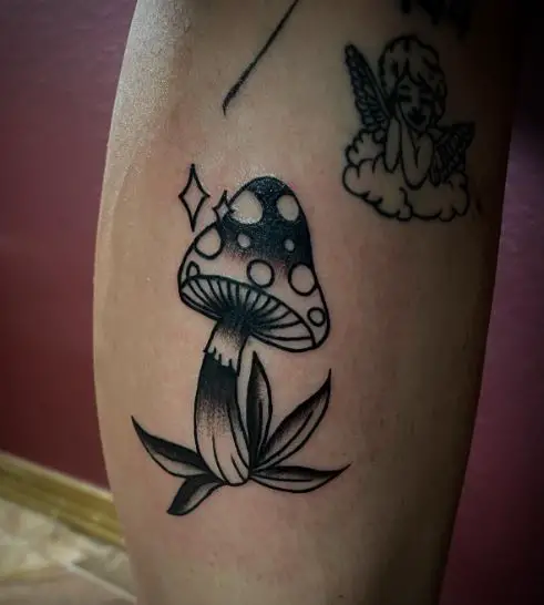 Black and Grey Star and Mushroom Leg Tattoo