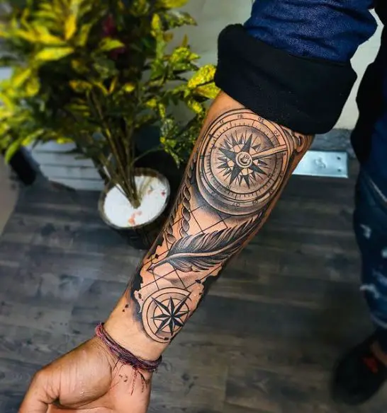 Feather and Compass Forearm Tattoo