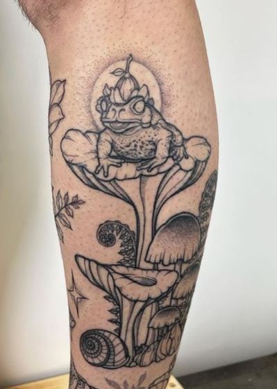 Grey Frog and Mushrooms Forearm Tattoo