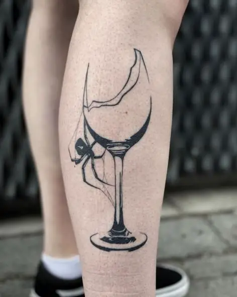 Broken Glass and Black Widow Leg Tattoo