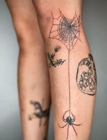 Black Widow Hanging on Spider Net Leg Tattoo