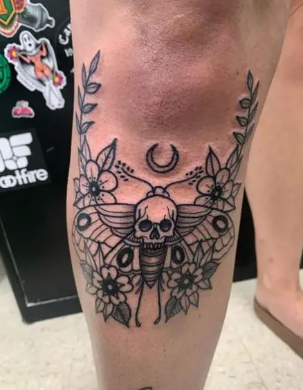 Flowers and Death Moth Leg Tattoo