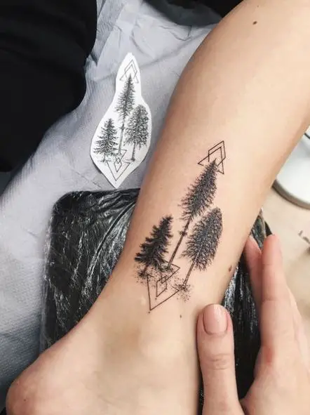 Geometrical Pine Trees Ankle Tattoo