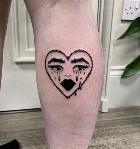 Black Crying Heart Leg Tattoo