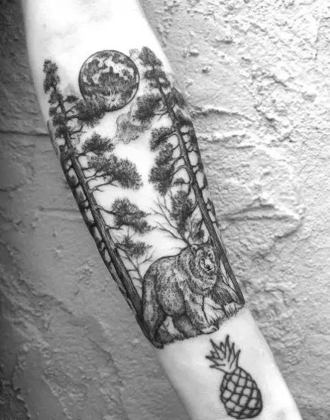 Bear and Pine Trees Forest Forearm Tattoo