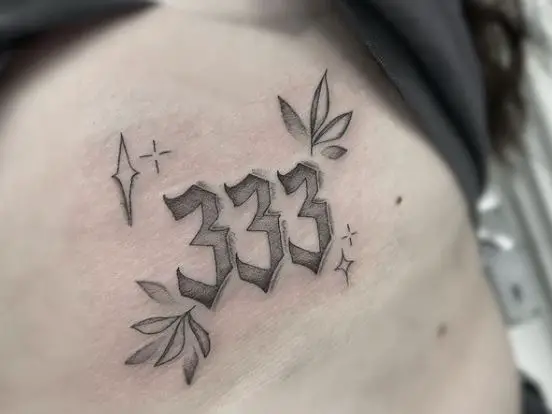 Leaves with Stars and 333 Ribs Tattoo