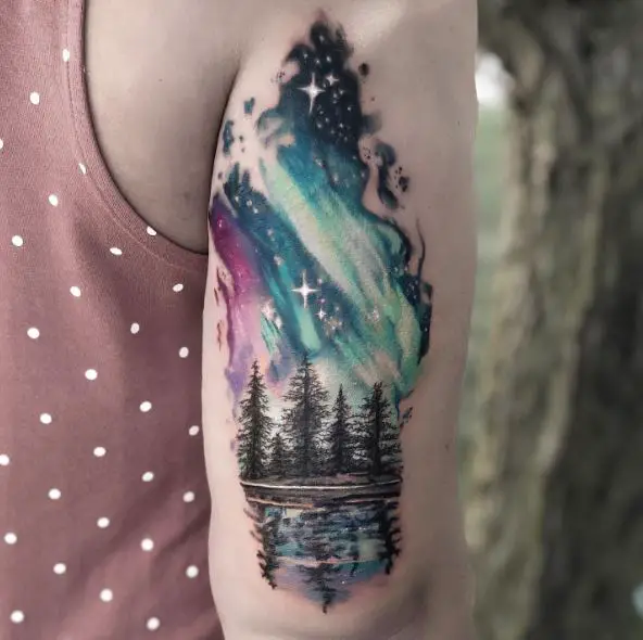 Aurora Borealis over Pine Trees Arm Tattoo