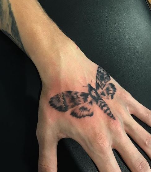 Black Shaded Death Moth Hand Tattoo