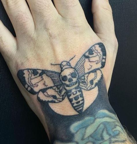 Grey Death Moth Hand Tattoo