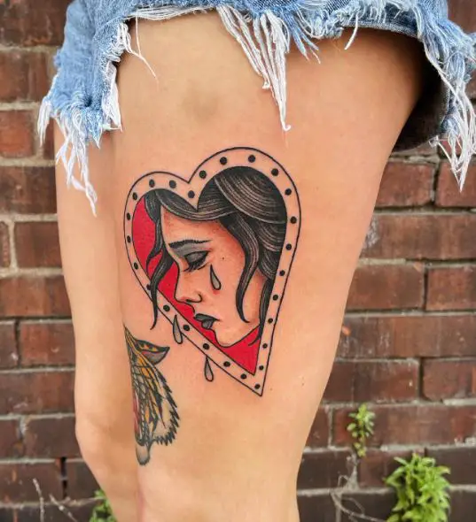 Framed Crying Heart Thigh Tattoo