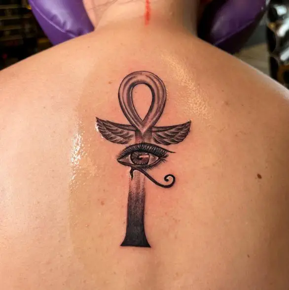 Eye of Horus and Ankh Spine Tattoo