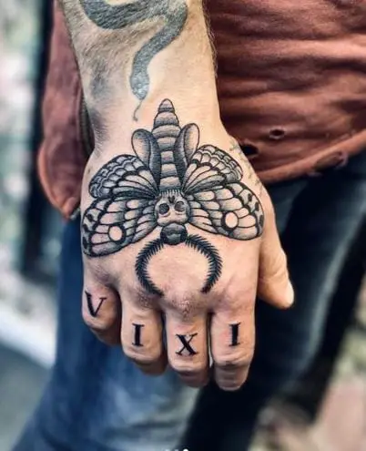 Roman Numbers and Death Moth Hand Tattoo