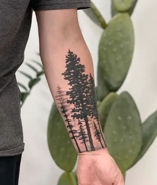 Dark Pine Forest Forearm Tattoo