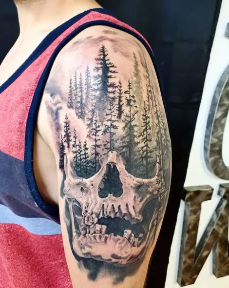 Skull and Pine Trees Arm Tattoo