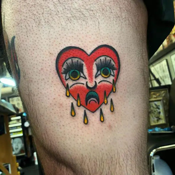 Red Crying Heart Thigh Tattoo
