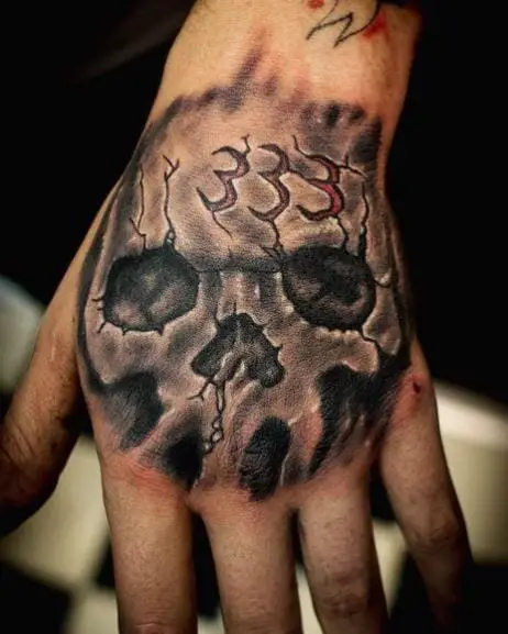 Grey Skull and 333 Hand Tattoo