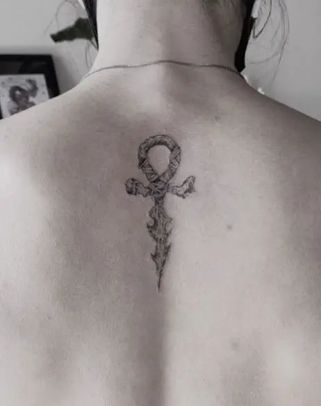 Grey Ankh Spine Tattoo