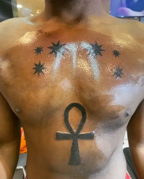 Stars over Ankh Belly Tattoo