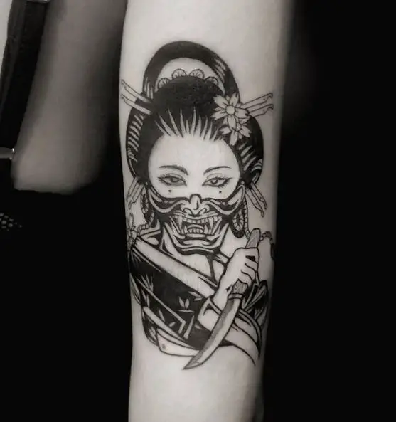 Black Geisha with Mask and Knife Arm Tattoo