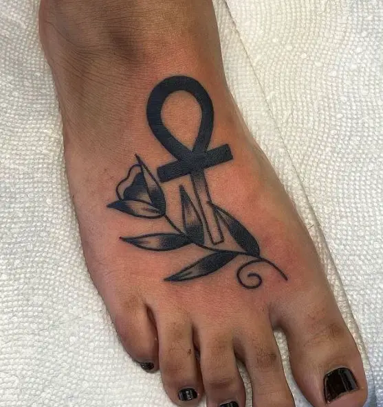 Flower and Ankh Foot Tattoo