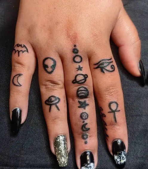 Eye of Horus and Ankh Finger Tattoo