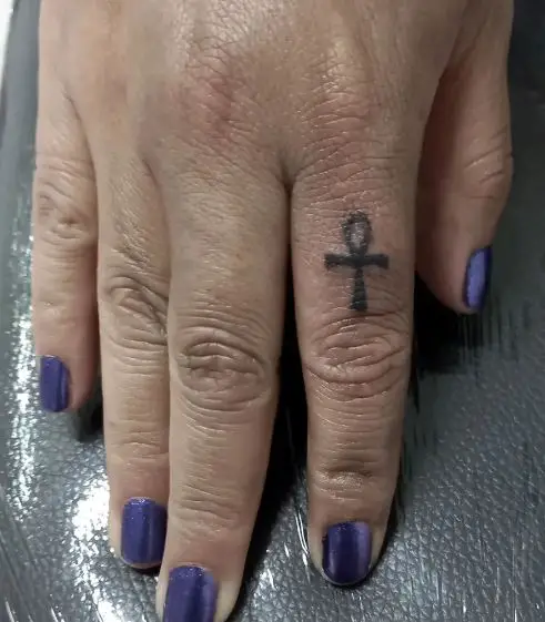Minimalistic Ankh Index Finger Tattoo