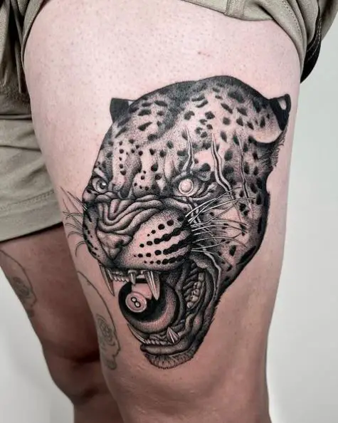 Battle Scarred Leopard with 8 Ball Tattoo