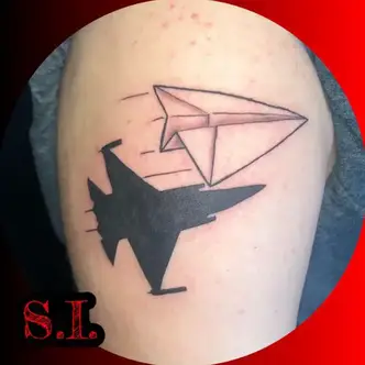 white paper airplane tattoo