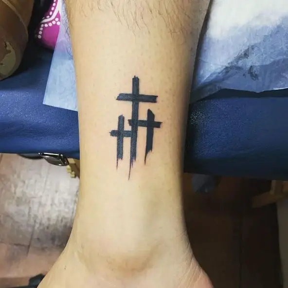 Black Three Cross Ankle Tattoo