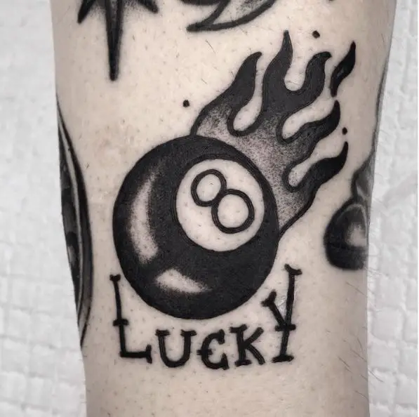 Black and Grey Flaming Lucky 8 Ball Tattoo