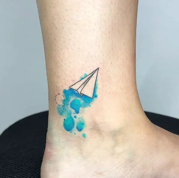 Blue Water Color Splash with Paper Plane Ankle Tattoo