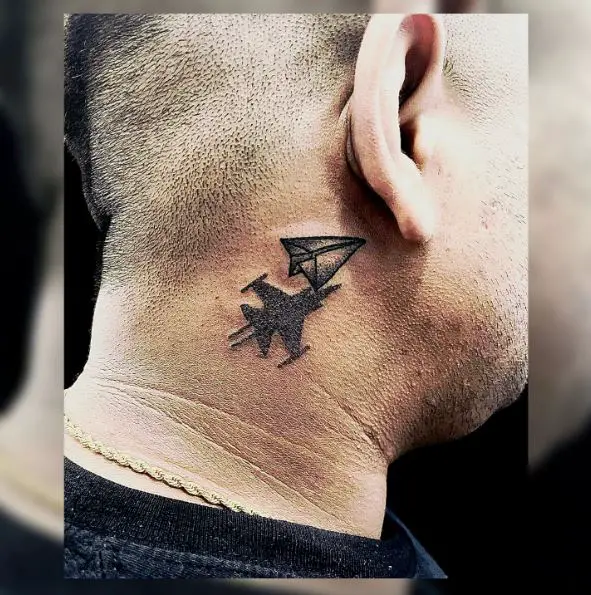 Bold Black Paper Plane and Real Plane Ear Tattoo