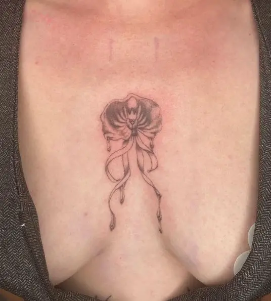 Clamshell Orchid Chest Tattoo