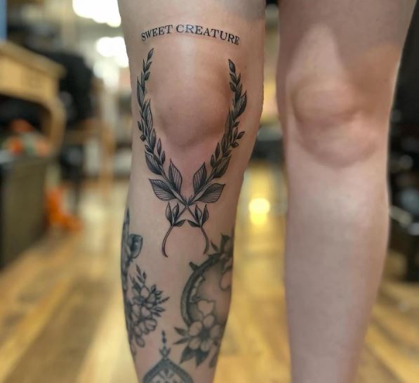 Cross Leaves Knee Tattoo