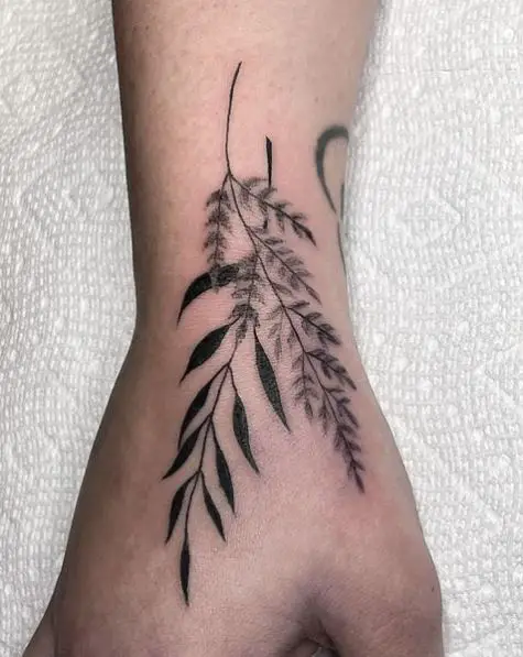 Dark and Faint Leaves Tattoo