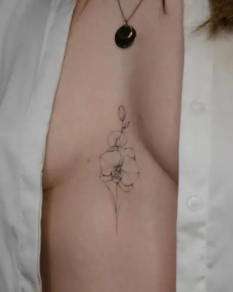 Delicate Tattoo Piece of Orchid Flower