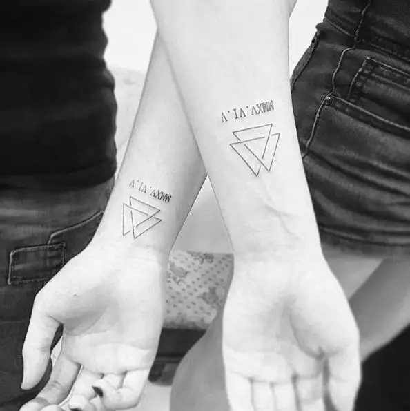 Double Triangle with Roman Numbers Wrist Tattoo