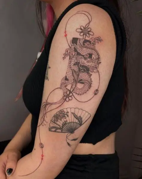 Dragon and Orchid Flower Arm Tattoo