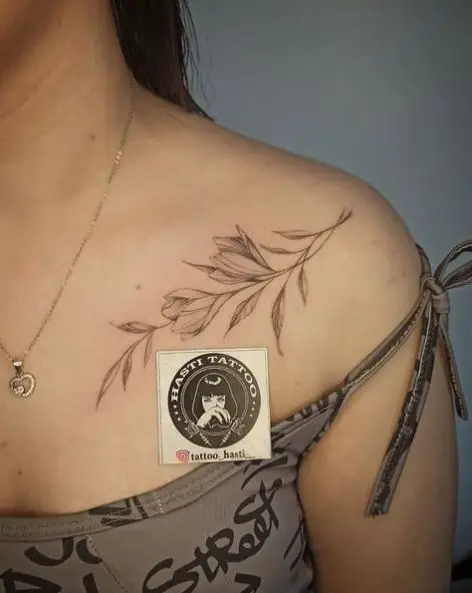 Grey Leaf Tattoo on Shoulder to Chest
