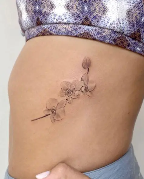 Grey Orchid Flower Tattoo on the Hip
