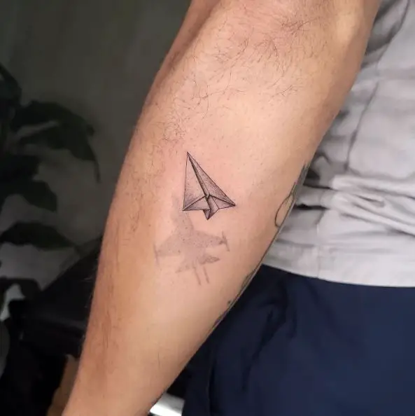Grey Paper and Shadow Plane Forearm Tattoo