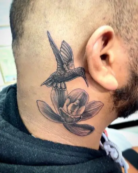 Greyscale Hummingbird and Orchid Tattoo